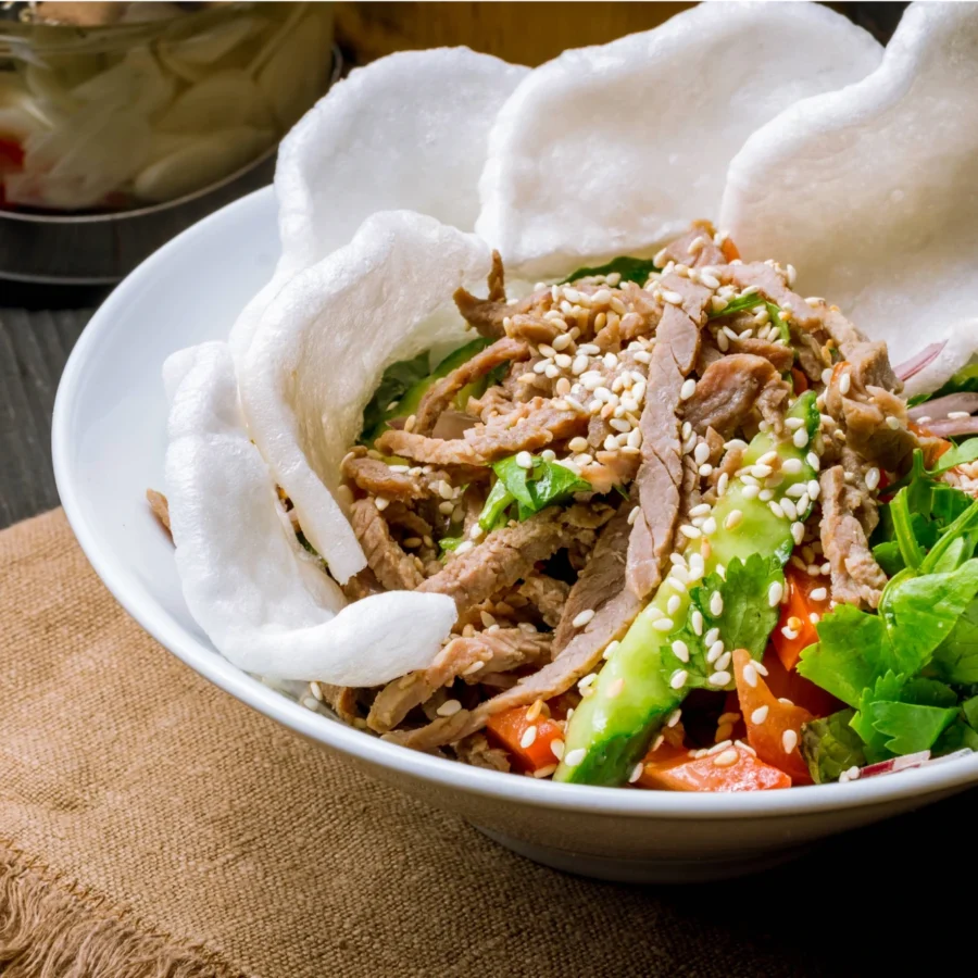 Yam Nea Yang with prawn crackers.