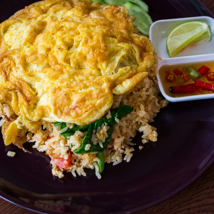 Thai omelette served on fried rice.