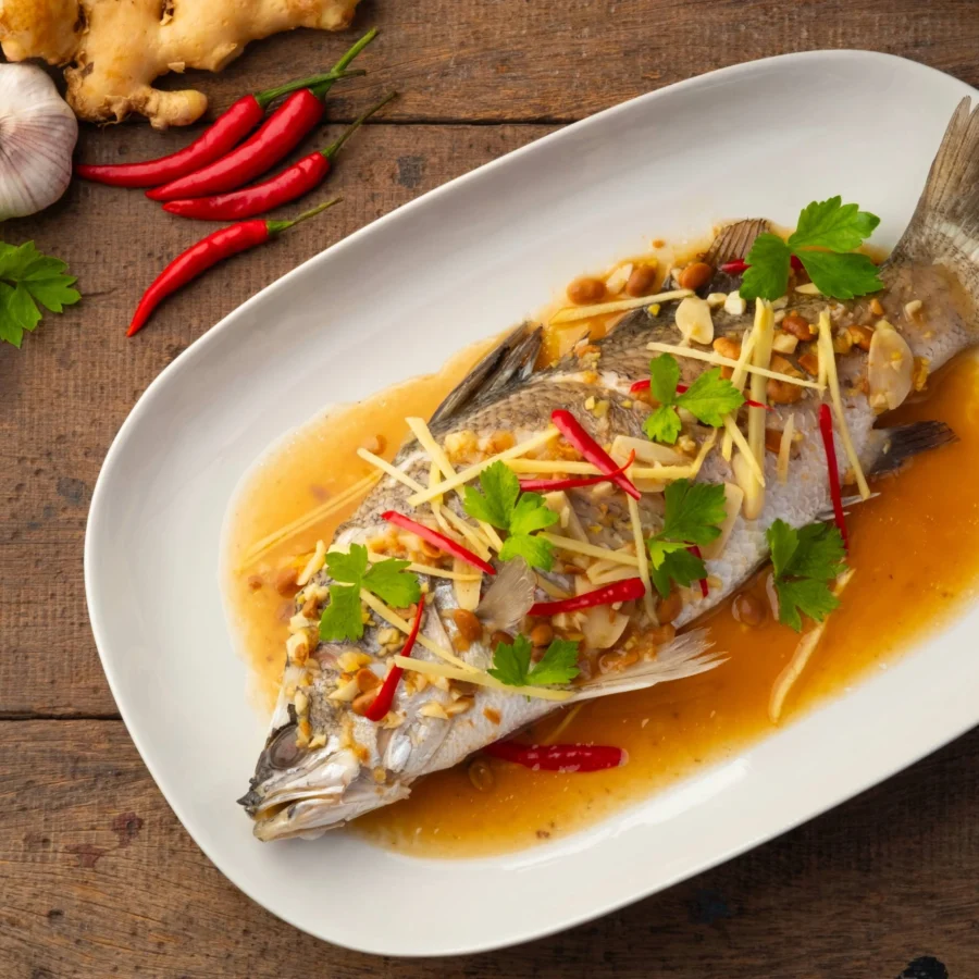 A whole sea bass served with Thai spices.